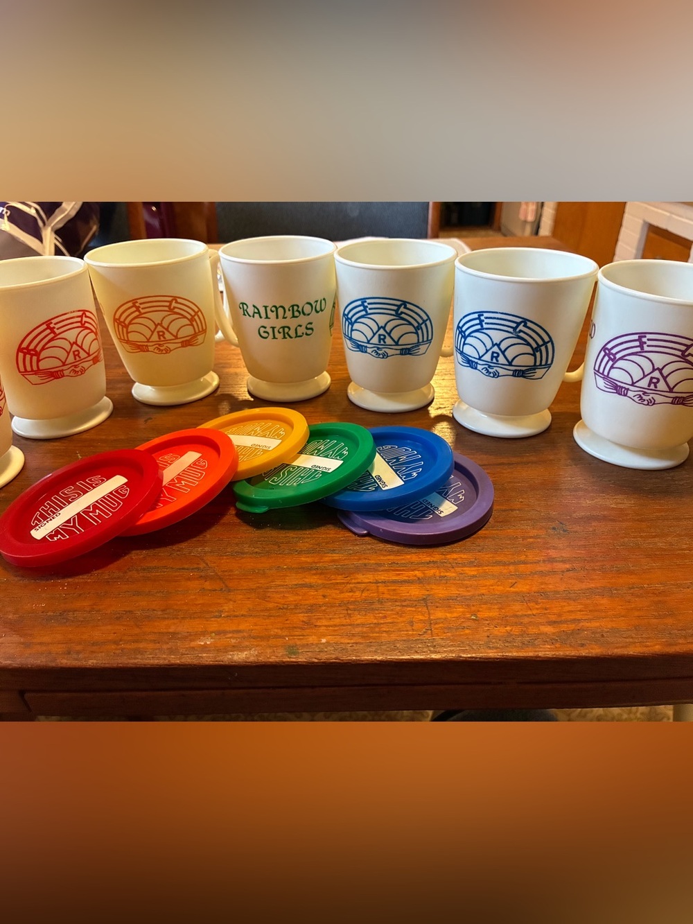 Rainbow for Girls mugs with lids.